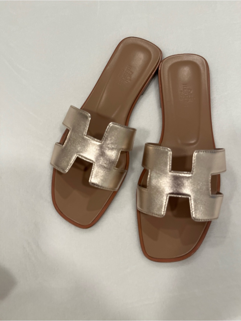 Hermes rose gold Oran slides